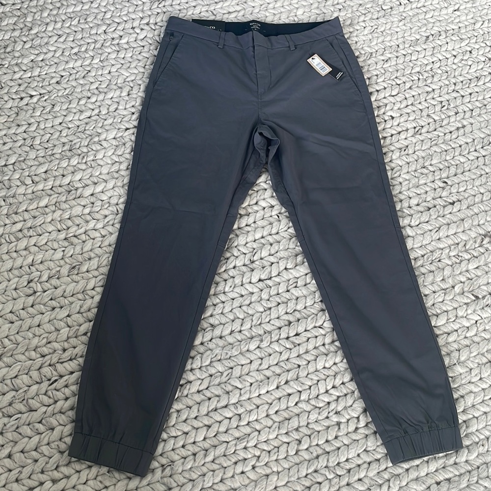 Slim Fit- Fitted through hip and thigh tapered leg